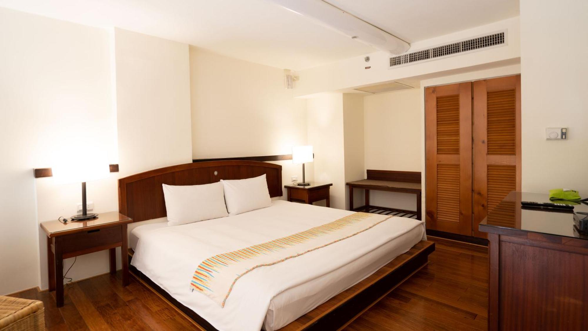 Yoho Beach Resort Kenting Heng-ch'un Buitenkant foto A bedroom at the hotel