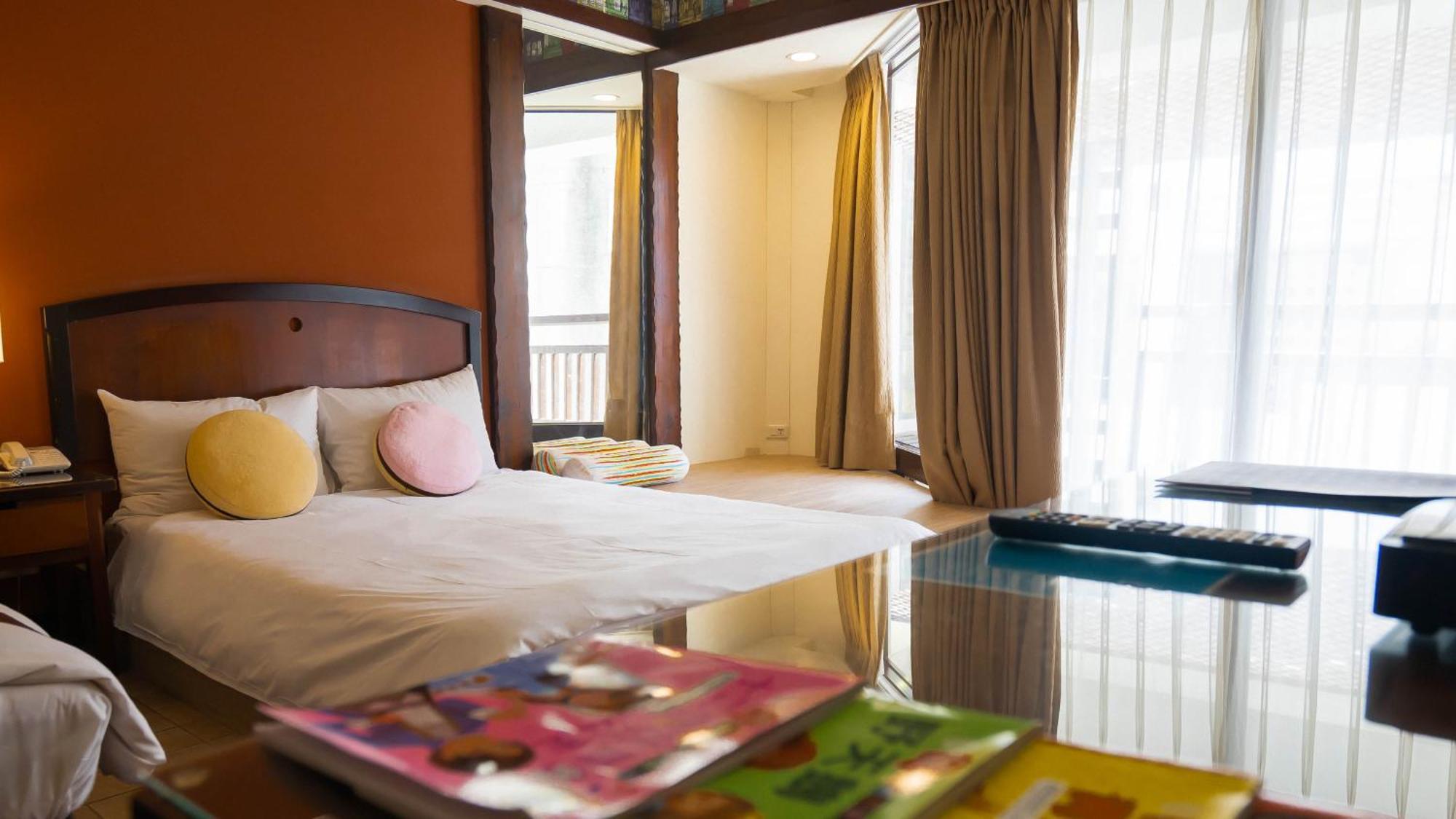 Yoho Beach Resort Kenting Heng-ch'un Buitenkant foto A bedroom at the hotel