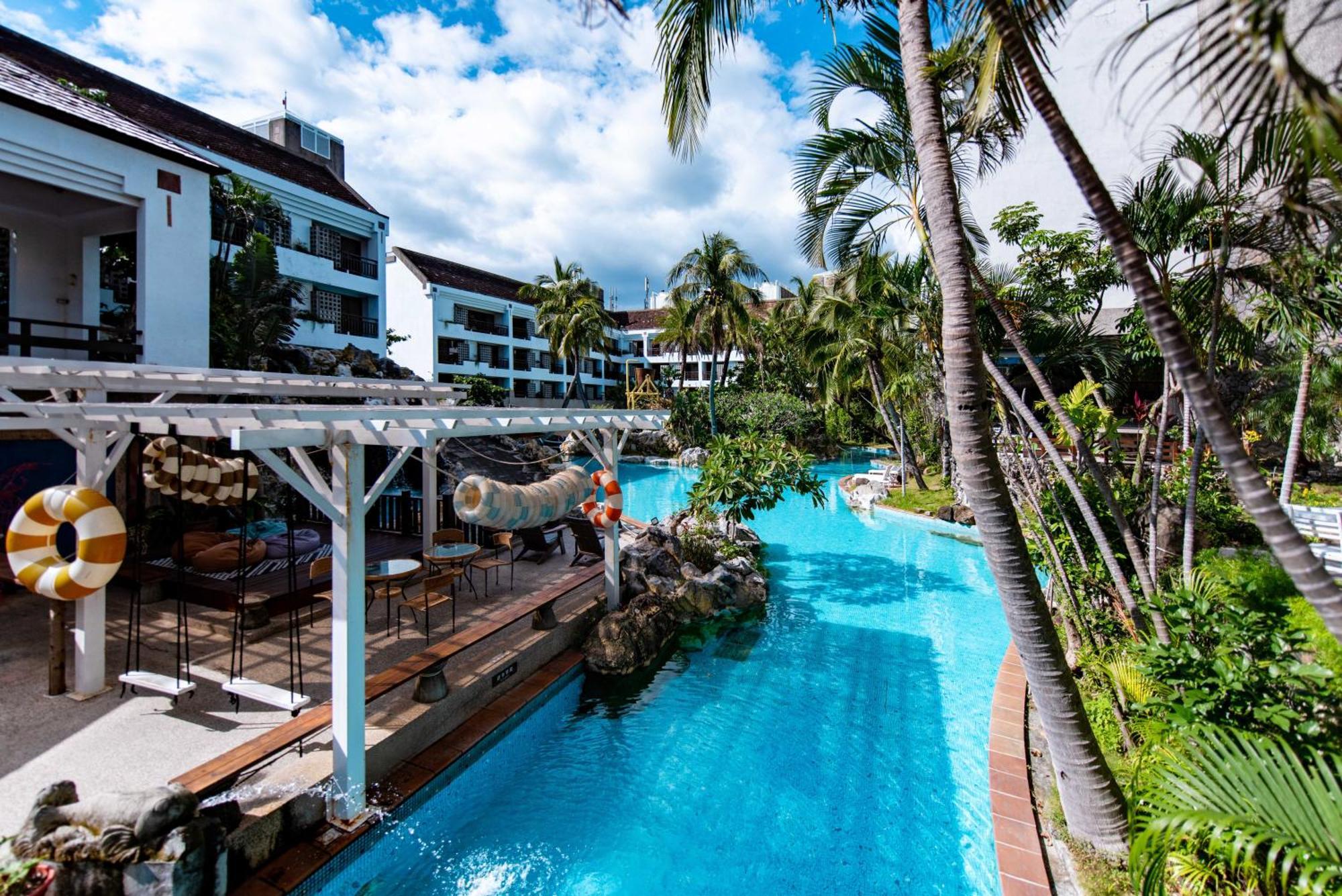 Yoho Beach Resort Kenting Heng-ch'un Buitenkant foto The swimming pool at the resort